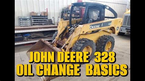 how to change oil on a john deere skid steer|john deere 328 oil change.